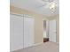 Bright bedroom with double door closet and neutral walls at 9114 Twilight Hill Ct, Charlotte, NC 28277