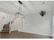 Dining area with dark tile floors and modern chandelier at 9114 Twilight Hill Ct, Charlotte, NC 28277