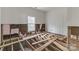 Unfinished bedroom with exposed subfloor and insulation at 1119 Poplar St, Albemarle, NC 28001