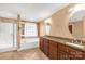 Double vanity bathroom with granite countertops and large mirrors at 128 Ferguson Ridge Rd, Clover, SC 29710