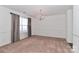 Dining room featuring neutral walls and carpeting at 136 Quail Springs Rd, Statesville, NC 28677