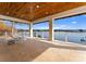 Covered patio with stunning lake views, perfect for outdoor relaxation at 16424 Green Dolphin Ln, Cornelius, NC 28031