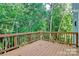 Wooden deck overlooking a wooded area at 2225 Southwind Dr, Charlotte, NC 28216