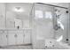 Large walk-in shower with marble tile and glass enclosure at 3252 Mcharney Dr # 37, Harrisburg, NC 28075