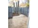 Private backyard with wooden fence and trees at 6130 Heathstone Ln, Charlotte, NC 28210