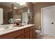 Elegant bathroom with double vanity and a large mirror at 6725 Dusty Saddle Rd, Charlotte, NC 28277