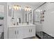 Modern bathroom with double vanity, frameless shower, and matte black fixtures at 727 Bradberry Ln, Indian Trail, NC 28079