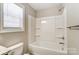 White bathtub and shower combo with built in shelving at 921 Pineridge Se St, Concord, NC 28025