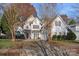 Two-story house with a welcoming front porch and driveway at 10113 Allison Taylor Ct, Cornelius, NC 28031