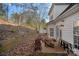 Home's exterior showcasing a patio and firepit at 10113 Allison Taylor Ct, Cornelius, NC 28031
