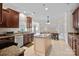 Modern kitchen with granite countertops and stainless steel appliances at 10113 Allison Taylor Ct, Cornelius, NC 28031