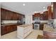 Modern kitchen with granite countertops and stainless steel appliances at 10113 Allison Taylor Ct, Cornelius, NC 28031