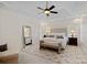 Bright main bedroom with a king-size bed and large windows at 10113 Allison Taylor Ct, Cornelius, NC 28031