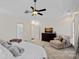 Main bedroom with a chaise lounge and ample natural light at 10113 Allison Taylor Ct, Cornelius, NC 28031