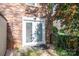 Exterior view of a white door leading to a finished basement at 104 Kennedy Dr, Lincolnton, NC 28092