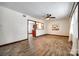 Living room with wood-look floors and a view into the kitchen at 110 Yorktowne St, Fort Mill, SC 29715