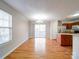 Bright dining area with hardwood floors and access to deck at 11116 Northwoods Forest Dr, Charlotte, NC 28214