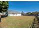 Fenced backyard with large grassy area at 12610 Cumberland Crest Dr, Huntersville, NC 28078