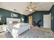 Large main bedroom with a king bed and access to the en-suite bathroom at 14126 Waterlyn Dr, Charlotte, NC 28278