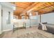 Charming bedroom with a built-in workspace and exposed brick wall at 201 Hoskins S Rd # 128, Charlotte, NC 28208