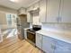 Modern kitchen with stainless steel appliances and gray cabinetry at 2117 Arden Dr, Monroe, NC 28112