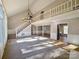 Vaulted living room with loft, chandelier, and hardwood floors at 2117 Arden Dr, Monroe, NC 28112