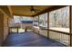 Spacious back porch with wooden deck and railing at 2438 Meadow Plaza Dr, Lancaster, SC 29720