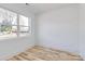 Simple bedroom with light wood flooring and window at 2601 Mcgill St, Kannapolis, NC 28081