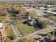 Elevated view showcasing the house, yard, driveway, and surrounding neighborhood at 318 N Elm St, Marshville, NC 28103