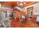 Foyer with hardwood floors, a grand staircase, and vintage furniture at 318 N Elm St, Marshville, NC 28103