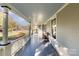 Inviting front porch perfect for relaxation at 318 N Elm St, Marshville, NC 28103