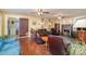 Cozy living room with hardwood floors, fireplace, and access to laundry at 318 N Elm St, Marshville, NC 28103