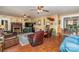 Living room with fireplace, wood floors, and comfortable seating at 318 N Elm St, Marshville, NC 28103
