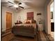 Bedroom with a queen-size bed and ceiling fan at 369 Pinecrest Cir, Troy, NC 27371