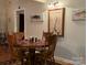 Simple dining room with wooden table and chairs at 369 Pinecrest Cir, Troy, NC 27371