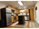 Galley kitchen with stainless steel appliances and island at 369 Pinecrest Cir, Troy, NC 27371