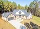 Impressive home with a large lot and tree-lined surroundings at 5164 Green Rd, Stanley, NC 28164