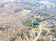 High-angle view of house and neighborhood, showcasing surrounding landscape at 5164 Green Rd, Stanley, NC 28164