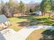 Aerial view showing house, expansive yard, and long driveway at 5164 Green Rd, Stanley, NC 28164