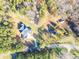 Aerial view of house with large lot and surrounding trees at 5164 Green Rd, Stanley, NC 28164