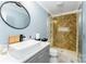 Modern bathroom with a floating sink and herringbone tile shower at 5164 Green Rd, Stanley, NC 28164