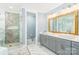 Elegant bathroom with double sinks, gray cabinets, and a large mirror at 5164 Green Rd, Stanley, NC 28164