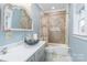 Modern bathroom with herringbone tile shower and glass vessel sink at 5164 Green Rd, Stanley, NC 28164