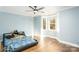 Bright bedroom with a bay window and ceiling fan at 5164 Green Rd, Stanley, NC 28164
