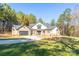 Stunning two-story home with stone accents and a large front yard at 5164 Green Rd, Stanley, NC 28164