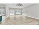 Spacious living area with hardwood floors and lots of natural light at 6701 Pleasant Grove Rd, Waxhaw, NC 28173