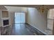 Spacious living room with hardwood floors, a fireplace, and lots of natural light at 8633 Sawleaf Ct, Charlotte, NC 28215