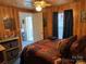 Bedroom with a queen-size bed and access to exterior at 101 Lake View Dr, Mount Gilead, NC 27306