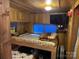 Upstairs bedroom with a double bed and TV at 101 Lake View Dr, Mount Gilead, NC 27306
