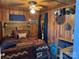 Main bedroom with a king-size bed and ceiling fan at 101 Lake View Dr, Mount Gilead, NC 27306